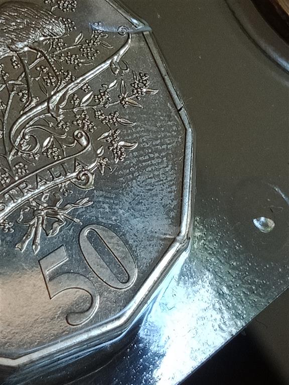 Fingerprints-On-Coins.